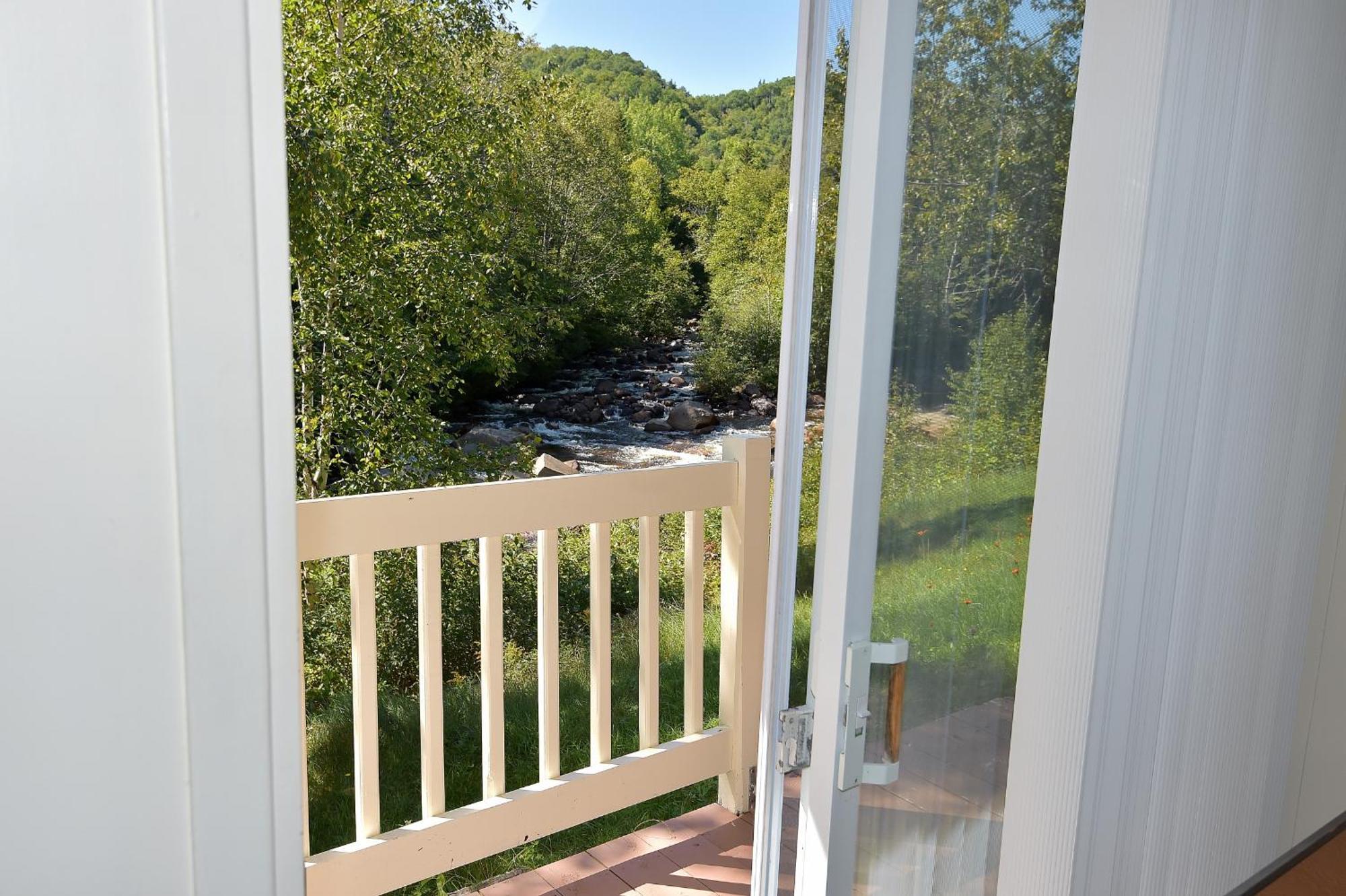 Motel Et Chalets Bo-Fleuve Evangeline Saint-Siméon Zimmer foto
